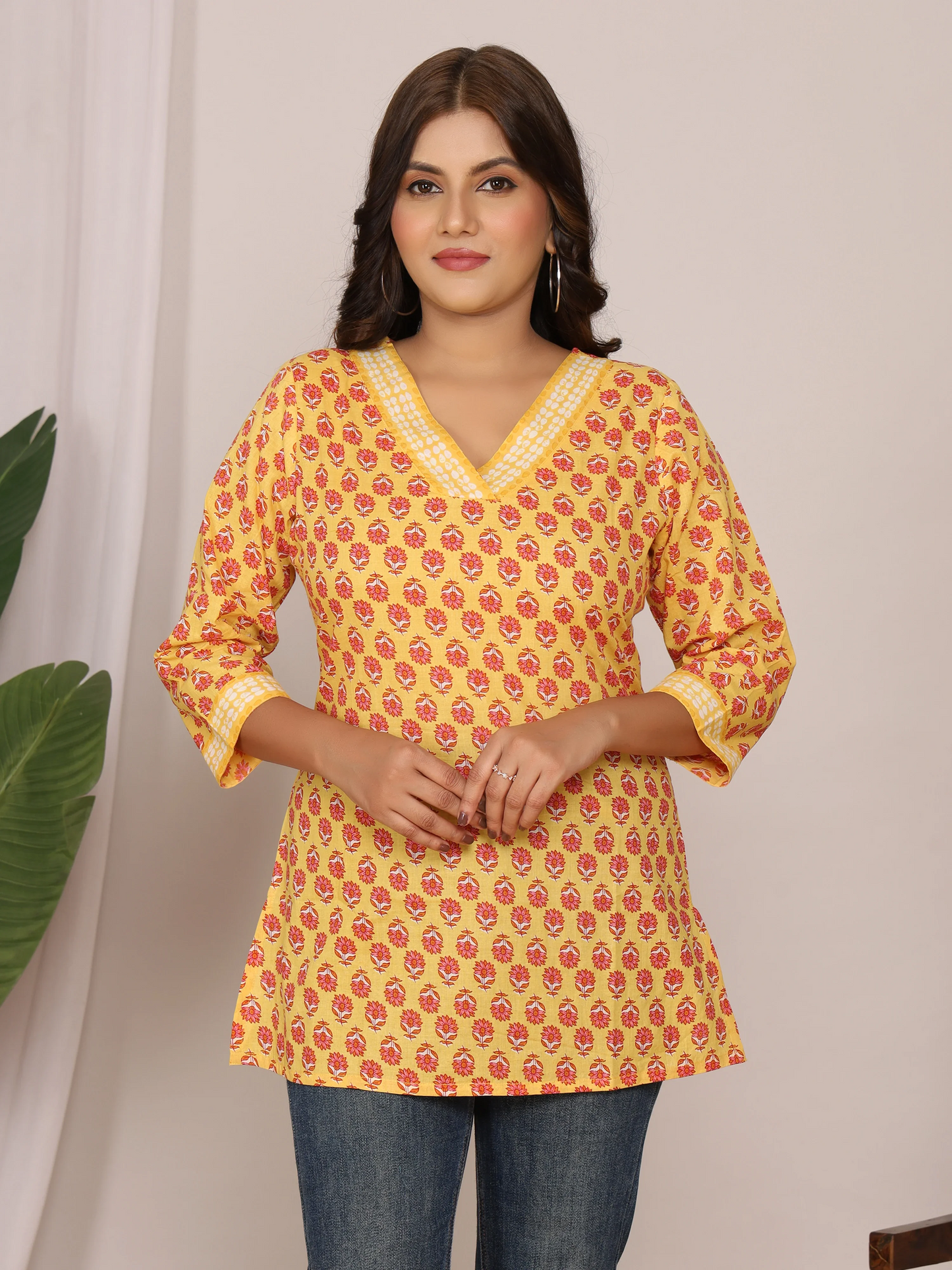 Yellow Floral Printed Cotton Short Kurti (with Lace Detailing)