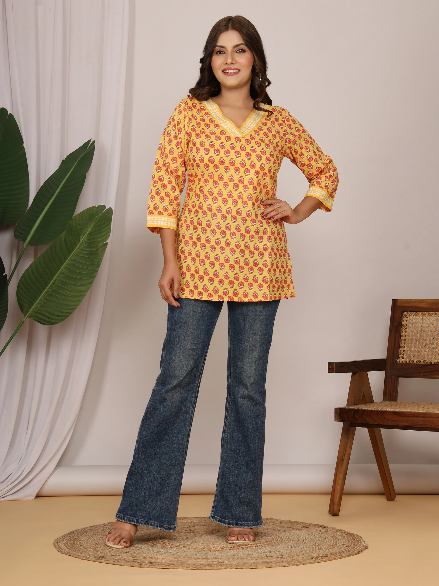 Yellow Floral Printed Cotton Short Kurti (with Lace Detailing)